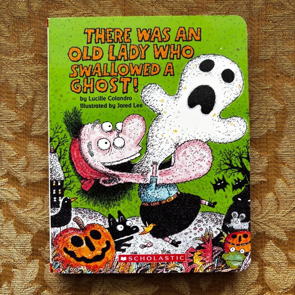 There Was an Old Lady Who Swallowed a Ghost! Board Book by Lucille Colandro